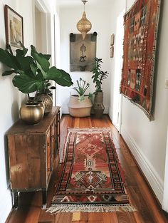 the hallway is clean and ready for us to use as an entrance way in this home