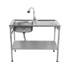 a stainless steel sink and shelf with a faucet on the left hand side