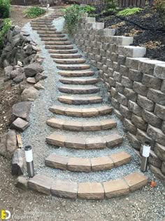 stone steps leading up to a rock wall