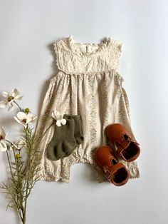 Indulge in luxury and elegance with our Vintage Lace Romper. Adorn your little one in delicate lace, evoking a sense of timeless beauty and grace. This price offers both style and comfort, making it the perfect choice for your little bundle of joy. 100% Cotton Fit is on the smaller side. Machine wash cold, tumble dry low heat. Tag is sewn to outside of item to prevent irritation to babes skin. Tags can be easily removed by pulling back the fabric and carefully trimming it off. Baby Clothes Vintage, Vintage Toddler Outfits, Vintage Baby Outfits, Vintage Baby Girl Outfits, Baby Clothes Aesthetic, Cottagecore Baby, Aesthetic Baby Clothes