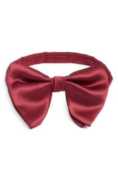 Smart and simple, this bow tie crafted from jewel-tone silk comes pre-tied with a small knot that emphasizes its classic shape. Pre-tied; adjustable 100% silk Spot clean Made in the USA of imported fabric Red Party Tie With Bow Tie Back, Pre-tied Decorative Bow Tie For Party, Pre-tied Bow Tie Back For Party, Pre-tied Bow Tie For Party, Standard Tie Satin Bow, Red Bow Standard Bow Tie For Party, Red Bow Tie For Party, Classic Pre-tied Butterfly Knot Bow Tie, Satin Ties With Decorative Bow For Party