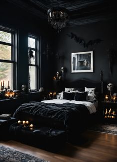 a bedroom decorated in black and white with candles