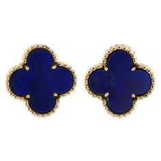 These stunning vintage Van Cleef & Arpels clip-on earrings from the Vintage Alhambra collection feature the lucky clover design crafted in 18k yellow gold and set with blue lapis lazuli gemstones. Made in France circa 1980s. Posts can be added upon request for pierced ears upon request. Measurements: 0.59" (15mm) width. Pre-owned. Shows some normal signs of wear. Comes with VCA pouch. Blue Van Cleef Earrings, Van Cleef Navy Blue, Luxury Yellow Gold Vintage Clip-on Earrings, Luxury Vintage Yellow Gold Clip-on Earrings, Blue Van Cleef, Van Cleef Earrings, Van Cleef Alhambra, Vintage Van Cleef, Navy Jewelry