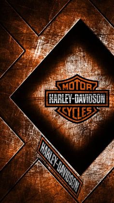 the harley davidson logo is shown on an orange and black background with silver squares around it