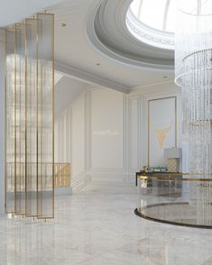 the interior of a luxurious white and gold hotel lobby with chandelier, marble flooring and walls