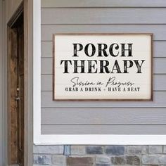 a porch therapy sign on the side of a house