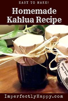 homemade kahlua recipe in jars tied with twine and labeled label on wooden table