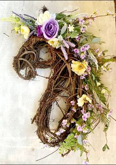 a horse head made out of branches and flowers