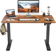 a computer desk with a monitor, keyboard and mouse on it in front of a white background