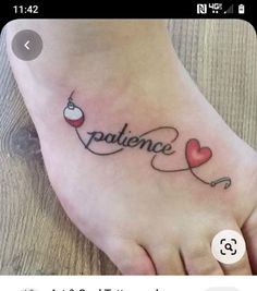 a person with a tattoo on their foot that reads, patiente and is holding a heart