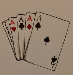 four playing cards are shown with the same design on them