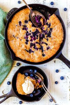 blueberry cobbler in a cast iron skillet with ice cream