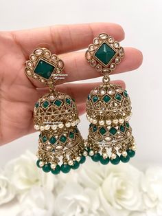 Trendy polki double Jhumki Statement Earrings/ Indian Jewelry/ Bollywood Jewelry/ High Quality Kundan and Polki Jewelry. All items are shipped from Brampton, Ontario, Canada. If you need your item by a certain day, please reach out to us for express delivery option before placing the order so that we can update the shipping for you. Standard shipping/delivery timeline Below are the estimated delivery times after the order is shipped/dispatched.  ---> USA delivery timeline * 3-5  business days to Cheap Bollywood Meenakari Jhumkas, Luxury Traditional Jhumkas For Festivals, Luxury Designer Wear Festive Jhumkas, Festive Temple Jewelry Earrings, Handmade Luxury Earrings For Diwali, Luxury Hand Set Jhumkas For Festive Occasions, Cheap Multicolor Jewelry For Diwali, Luxury Multicolor Jhumkas For Celebration, Luxury Bollywood Hand Set Earrings