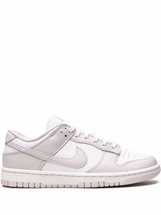 White leather Dunk Low sneakers from NIKE featuring signature Swoosh logo detail, embroidered logo to the rear, round toe, front lace-up fastening, logo patch at the tongue, branded insole and rubber sole. These styles are supplied by a premium sneaker marketplace. Stocking only the most sought-after footwear, they source and curate some of the most hard to find sneakers from around the world.. | Nike Dunk Low sneakers Nike Dunks Neutral, Vanilla Girl Shoes, Stockx Sneaker, Dunk Low Venice, Stockholm Shoes, Nike Dunks Low, Bougie On A Budget, Nike Tenis, Outfits Capsule Wardrobe