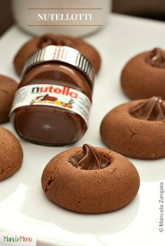 chocolate cookies with nutella spread on them and the words nutella written in front