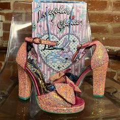 Brand New With Original Box. Irregular Choice Flaming June Pink Glitter Platform Heels Size 6.5 (37 Eu) A Collectors Item. Beautiful Floral Design Inside The Shoe, Pink Glitter On The Outside. Definitely A Statement Piece! Glitter Platform Heels, Flaming June, Irregular Choice Shoes, Irregular Choice, Pink Glitter, Platform Heels, Shoes Women Heels, What To Wear, Original Box