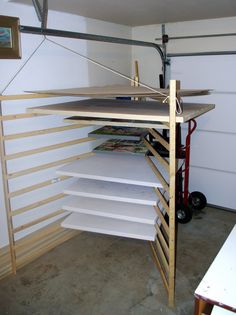 the shelves are made from plywood and have been assembled to hold various items for storage