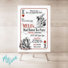 this is an image of a mad hatter tea party poster on a easel