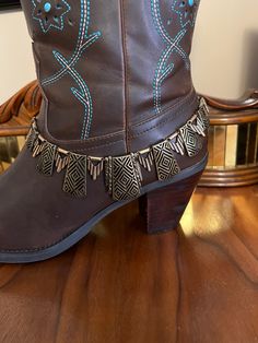 "This handmade boot bracelet features bronze open cutwork pieces with a diamond design. It also has embossed charms & spikes. They are strung on bronze silk thread. Total length is 16\". This item is sold as a single.  This piece is designed with the bold woman in mind. Wear it to concerts, festivals or parties. Made in the USA." Boot Chains, Boot Bracelet, Gold Boots, Silver Boots, Boot Bling, Wedding Boots, Bullet Jewelry, Handmade Boot, Boot Straps