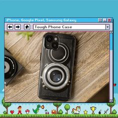 an iphone case with a camera on top of it, next to a game controller