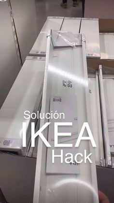 an advertisement for a new appliance in the middle of some boxes with tags on them