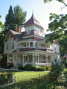 an old victorian style house with a turret