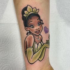 a cartoon character tattoo on the leg of a person with a heart in her hand