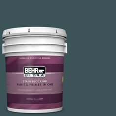 the behr ultra stain and primer in one is shown on a gray background