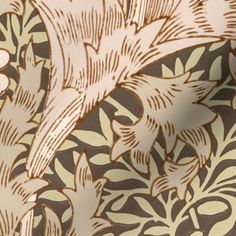 a close up view of an intricately designed wallpaper with gold and brown colors