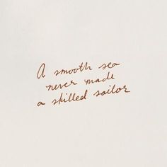 handwriting written in brown ink on white paper with writing underneath it that says, a smooth sea never made a skilled sailor