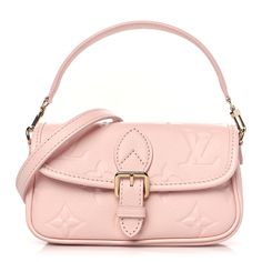 This is an authentic LOUIS VUITTON Empreinte Monogram Nano Diane in Pink Opale. This chic shoulder bag is crafted of oversized Louis Vuitton monogram embossed on grained calfskin leather in light pink. The bag features a leather strap handle, an optional adjustable leather shoulder strap, and polished gold-toned hardware. The front flap opens with a magnetic faux buckle to a matching microfiber interior. Louis Vuitton Empreinte, Oversized Bag, Dior Jewelry, Versace Bags, Wallet Fashion, Hobo Handbags, Luxury Accessories, Bag Straps, Authentic Louis Vuitton