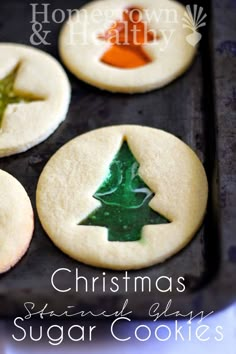 christmas sugar cookies decorated with a tree and star