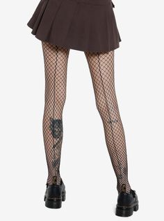 Keep your outfit trendy with these fishnet tights on! They feature a prominent back stitch to add dimension. High Stretch Fishnet Mesh Tights, High Stretch Mesh Fishnet Bottoms, Stretch Mesh Fishnet Tights, High Stretch Fishnet Tights, Fall Mesh Stretch Tights, Black Fishnet Mesh Tights, Stretch Fishnet Mesh Stockings, Black Fishnet Hosiery For Fall, Edgy Mesh Fishnet Tights