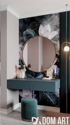 a dressing table with a mirror and stool in front of a floral wallpapered wall