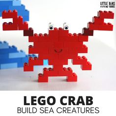 the lego crab is made out of red and blue bricks, with eyes on it's head