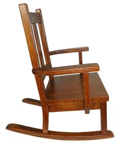 a wooden rocking chair on a white background