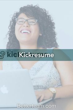 a woman laughing while looking at her macbook in front of her with the words kickresume on it