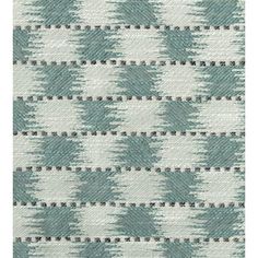 a blue and white pattern on fabric