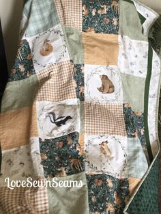 a baby quilt with animals on it