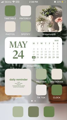 a calendar with green and white colors on the front, and an image of flowers in vase