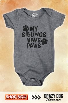 Celebrate the special bond between babies and their furry family with our 'MY SIBLINGS HAVE PAWS' baby bodysuit. This adorable and light-weight outfit is perfect for the littlest member of a pet-loving pack. It's designed for comfort and style, with a humorous twist that pet-owning parents will appreciate. Whether it's for a family photo or just everyday cuteness, this bodysuit is a heartwarming choice for your baby. An ideal gift for toddlers who share their home with four-legged siblings! My Siblings Have Paws, Mom And Baby Outfits, Nerdy Shirts, Novelty Clothing, Baby T Shirts, Baby Shirts, Baby Dogs