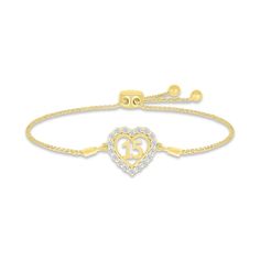 Make her April birthday even more special with this beautiful bolo bracelet. Styled in 10K yellow gold, the number 15 shines within a heart adorned in sparkling white lab-created sapphires. The 9.5-inch wheat chain secures with an adjustable bolo clasp. Adjustable Yellow Gold Heart Bracelet For Anniversary, Gold Heart Cut Diamond Bracelet For Anniversary, Gold Heart Bracelet With Diamond Accents For Valentine's Day, White Gold Heart Jubilee Bracelet For Anniversary, Anniversary Heart Bracelet In White Gold With Jubilee Style, Adjustable Fine Jewelry Heart Bracelet For Anniversary, Valentine's Day Gold Heart Bracelet With Diamond Accents, White Adjustable Gold Bracelet For Anniversary, White Adjustable Heart Bracelet For Anniversary