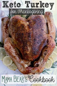 a turkey on a plate with lemons and rosemary