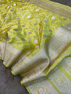 This is a very beautiful high quality mashru silk saree . All over zari motifs design with border . Saree length - 5.5 mtr. Blouse - 1 mtr. Dry clean only . Please note - color may be vary a little due to sunlight and photography . Please message us after purchasing in case you want fall and Pico done it not . No extra charges for fall and Pico but inform us . Blouse stitching is also available . Pista Green Art Silk Pre-draped Saree For Puja, Pista Green Katan Silk Saree, Pista Green Banarasi Silk Pre-draped Saree For Eid, Bollywood Style Pista Green Saree With Zari Weaving, Pista Green Banarasi Silk Saree For Diwali, Pista Green Saree For Festivals With Traditional Drape, Diwali Pista Green Banarasi Silk Saree, Pista Green Katan Silk Saree With Cutdana, Pista Green Saree With Zari Weaving For Diwali