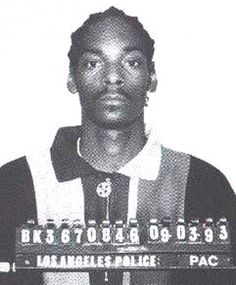 a man in a black and white mug shot