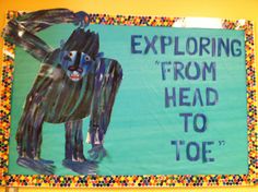 a bulletin board with an image of a gorilla and the words exploring from head to toe