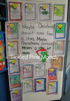 a bulletin board that has been decorated with christmas pictures and other writing on the front