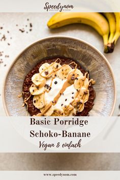 a bowl filled with chocolate and bananas on top of a table