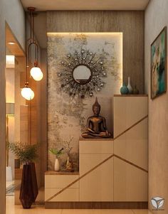 a buddha statue sitting on top of a wooden shelf next to a mirror and vase