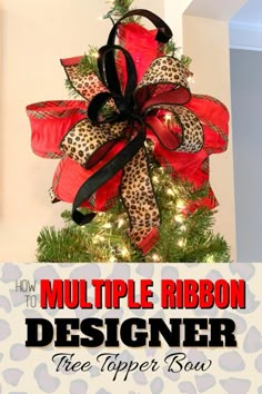 a christmas tree decorated with leopard print and red ribbon